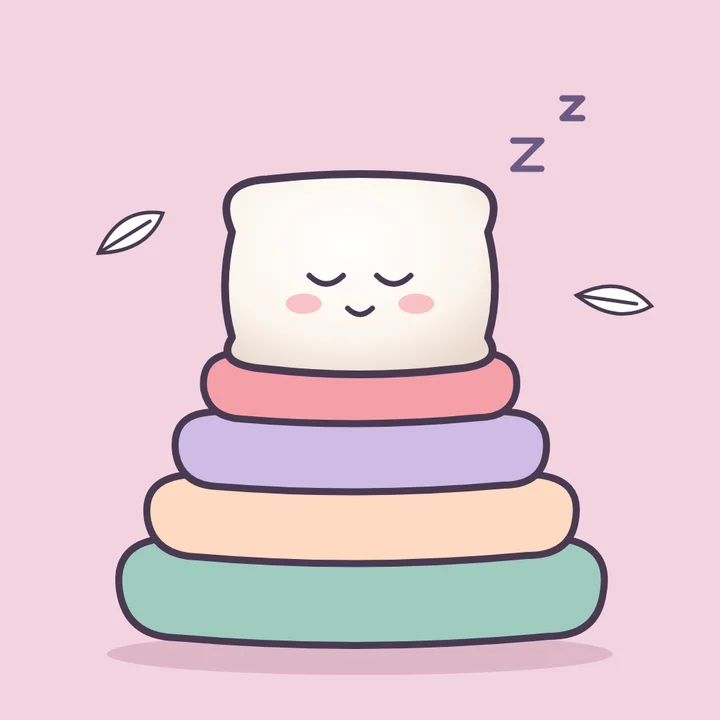 A tall stack of pastel pillows